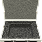 Open hard-shell protective case with black interior foam lining on a white background