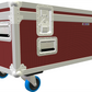 Red and white flight case with wheels on a white background